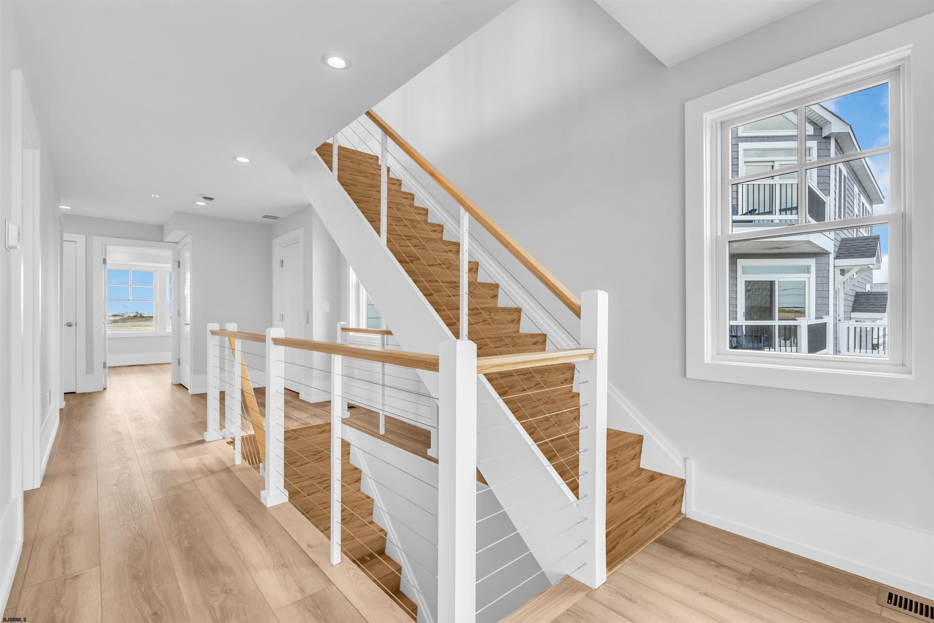 117 Taylor Avenue Strathmere, NJ 08248 - Photo 8 of 70 a view of entryway and hall with wooden floor