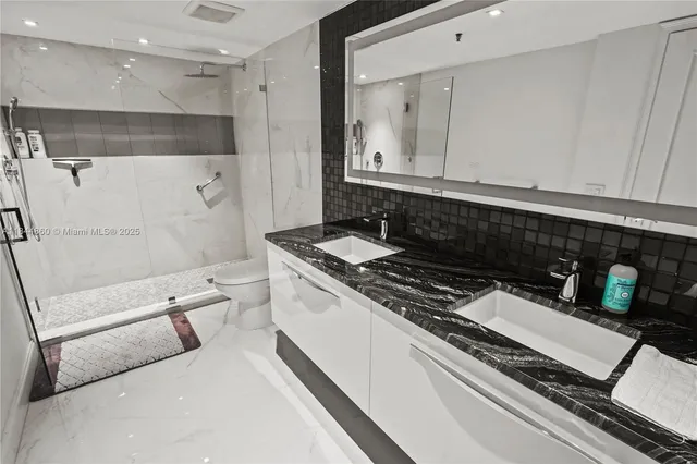 a kitchen with a stove and a refrigerator