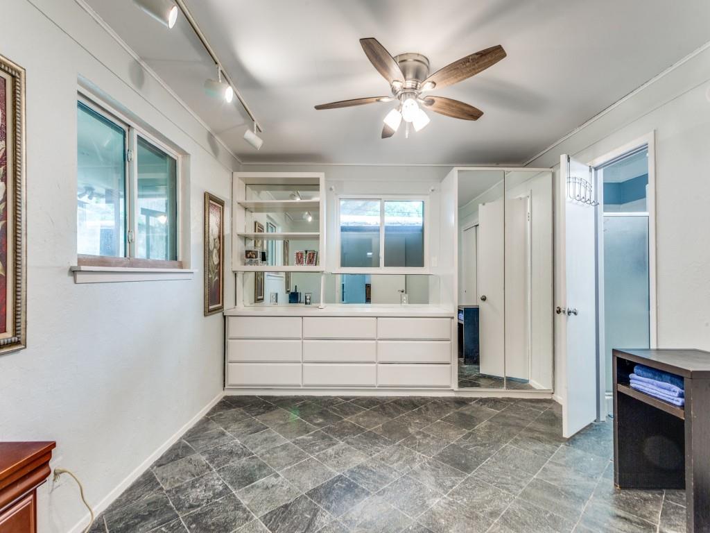 405 Chandler Lake Road Fort Worth, TX 76103 - Photo 15 of 20 a view of room with window and a ceiling fan