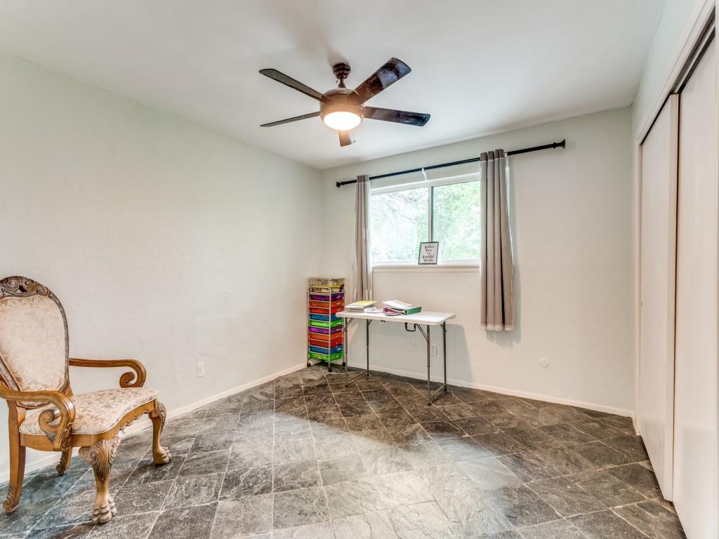 405 Chandler Lake Road Fort Worth, TX 76103 - Photo 16 of 20 a view of a workspace with furniture and a window