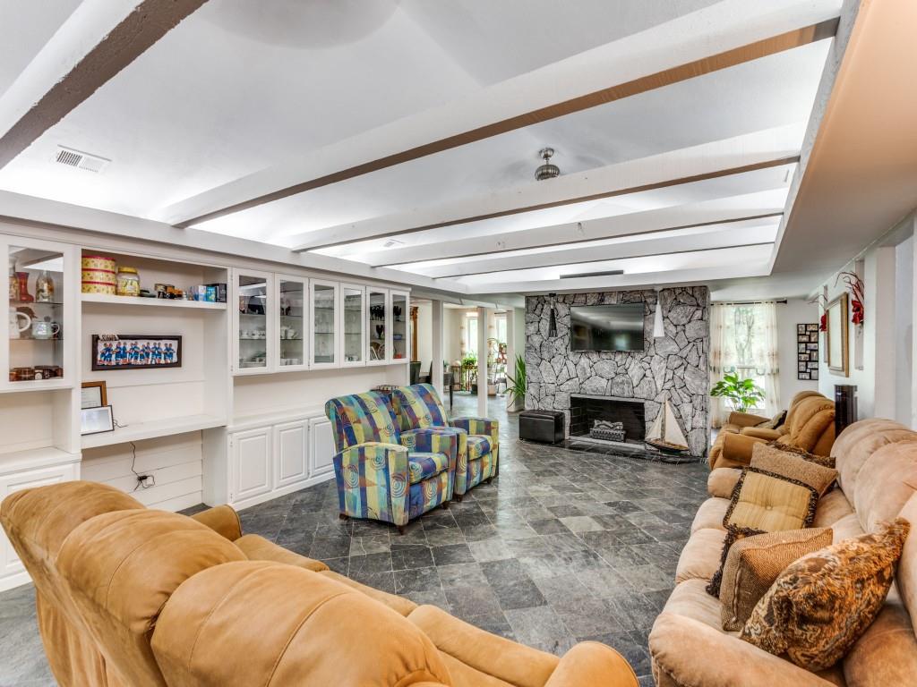 405 Chandler Lake Road Fort Worth, TX 76103 - Photo 7 of 20 a living room with furniture and a fireplace