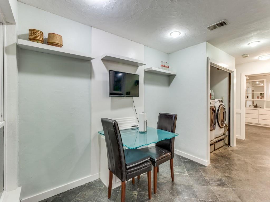 405 Chandler Lake Road Fort Worth, TX 76103 - Photo 9 of 20 a work room with furniture and a wooden floor