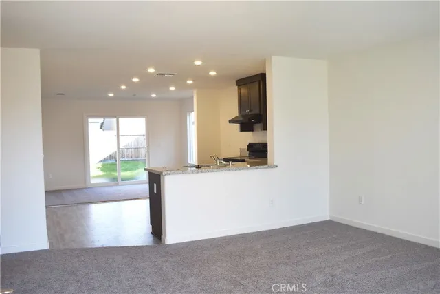 a view of kitchen with wooden floor
