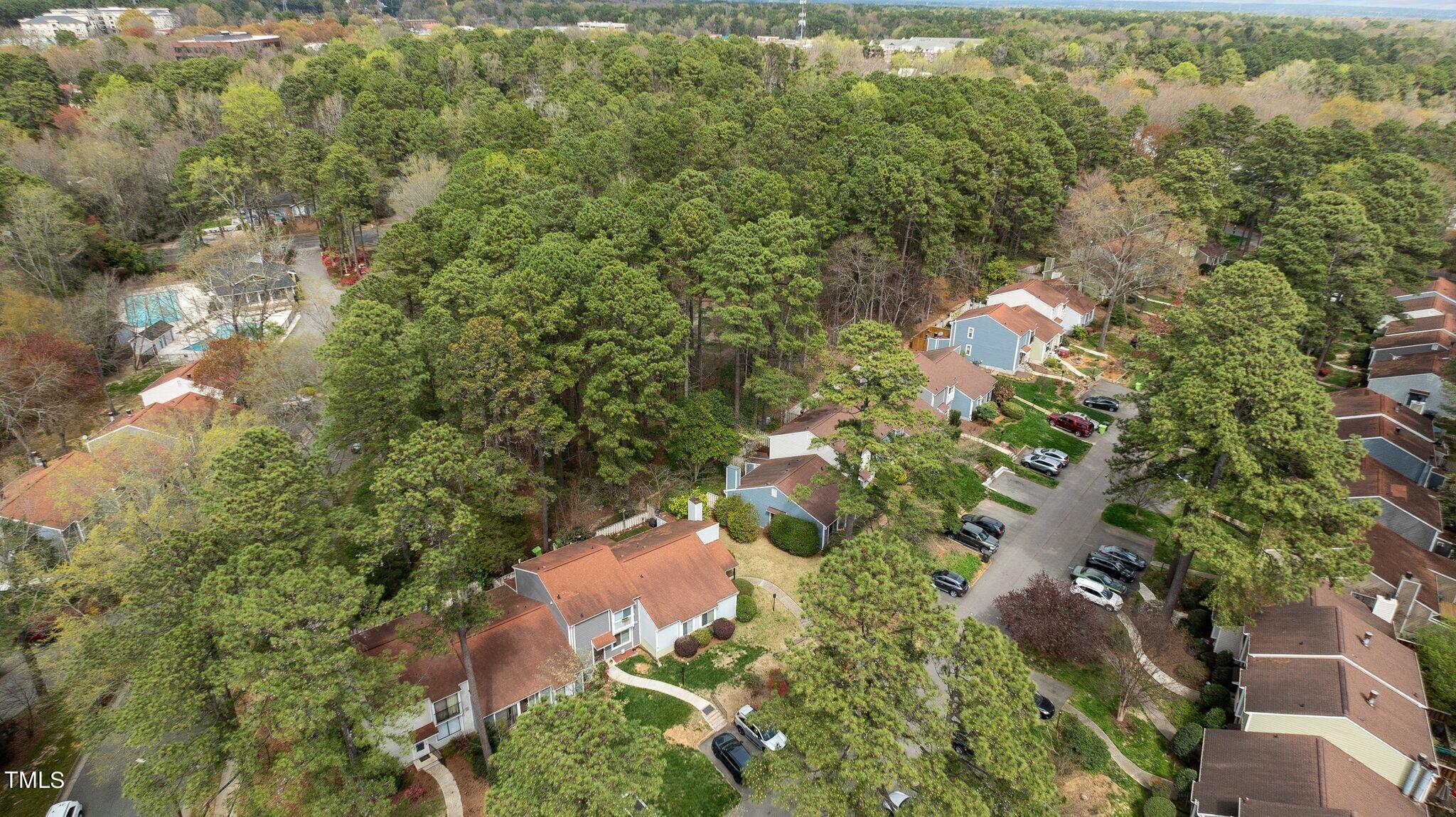 805 Green Ridge Drive Raleigh, NC 27609 - Photo 46 of 57 an aerial view of a house with a yard