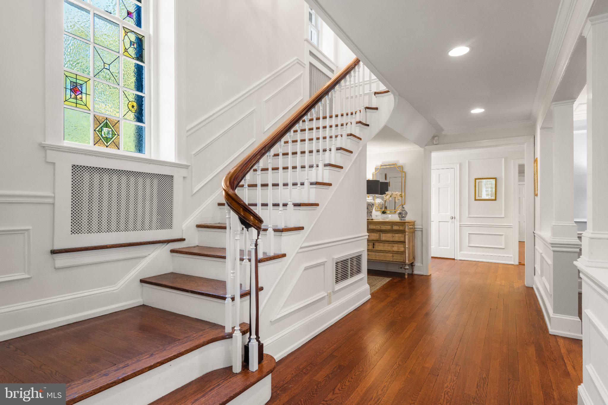 511 Fishers Road Bryn Mawr, PA 19010 - Photo 3 of 7 a view of entryway with wooden floor and stairs