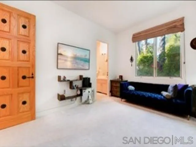 17381 Circa Oriente Rancho Santa Fe, CA 92067 - Photo 11 of 37 a living room with furniture and a large window