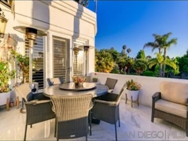 17381 Circa Oriente Rancho Santa Fe, CA 92067 - Photo 23 of 37 a view of a patio with couches and potted plants