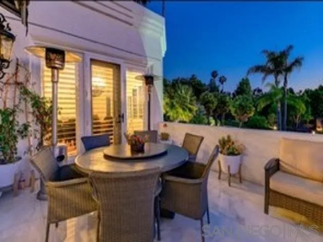 17381 Circa Oriente Rancho Santa Fe, CA 92067 - Photo 34 of 37 a view of a patio with couches chairs and potted plants