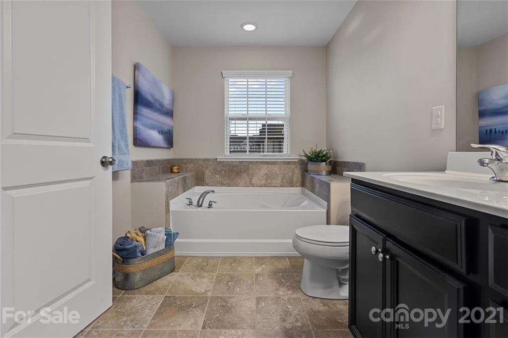 1128 Roderick Drive Fort Mill, SC 29708 - Photo 22 of 30 a bathroom with a bathtub sink and toilet