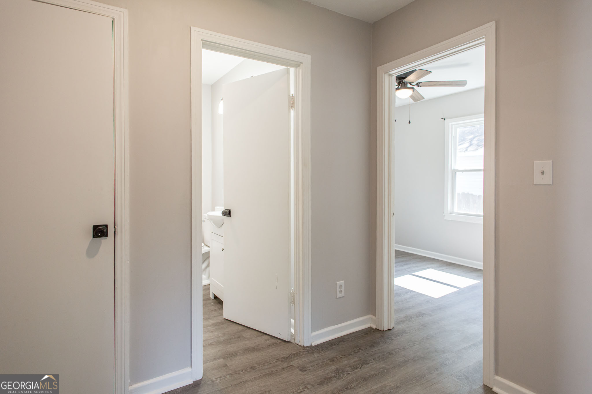 2312 Spurgeon Street Waycross, GA 31501 - Photo 13 of 20 a view of empty room with wooden floor