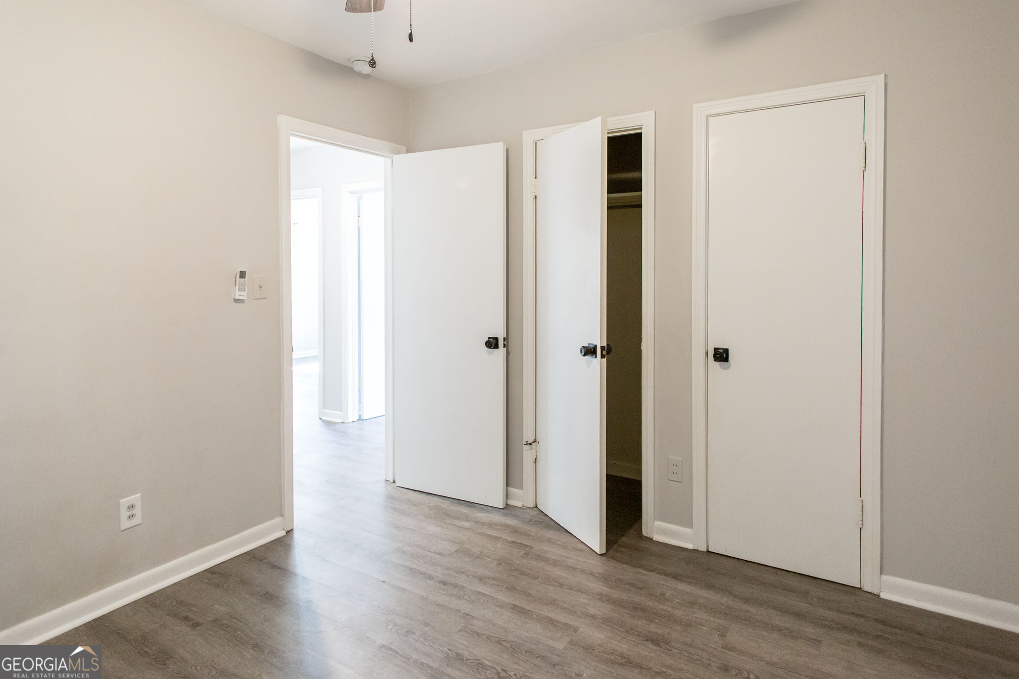 2312 Spurgeon Street Waycross, GA 31501 - Photo 20 of 20 a view of an empty room with wooden floor