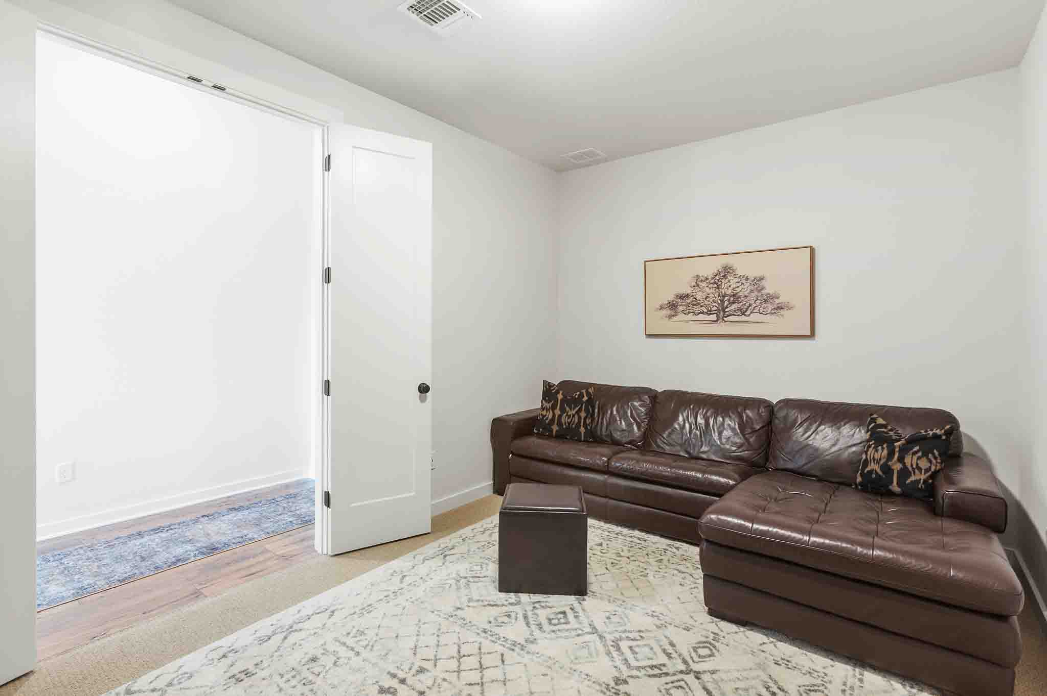 220 Basket Flower Loop Kyle, TX 78640 - Photo 13 of 40 A quiet and adaptable space for relaxation or productivity, easily convertible to suit your needs.