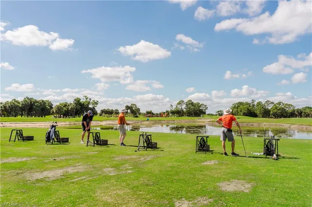 a childrens park with lots of swings and slides