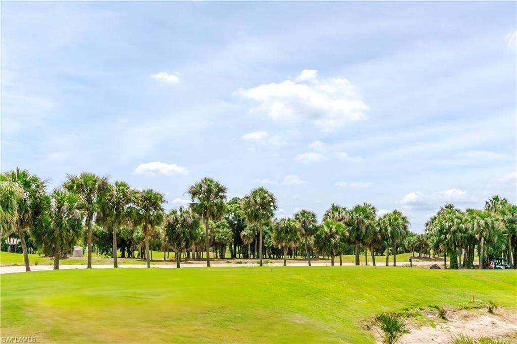 9099 Leatherwood Loop Lehigh Acres, FL 33936 - Photo 29 of 30 a view of a golf course