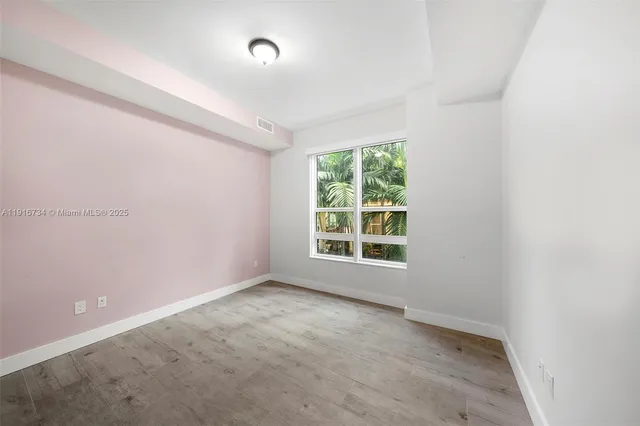 an empty room with a window