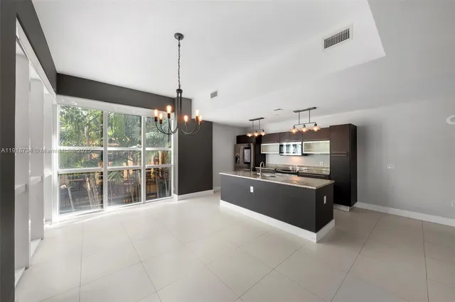 a room with window and furniture