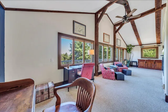 a view of a balcony with wooden floor