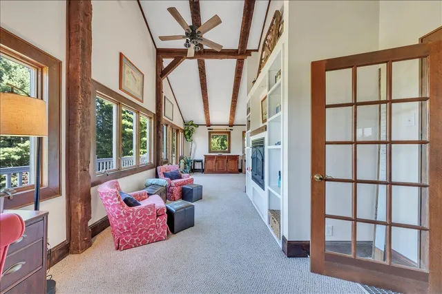 a view of a balcony with wooden floor