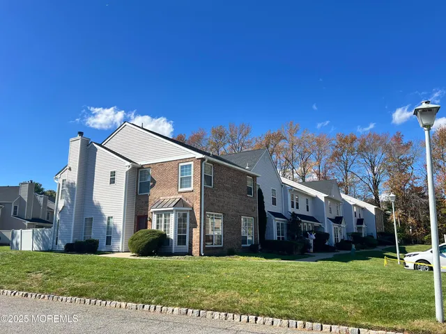 a view of a house with a big yard