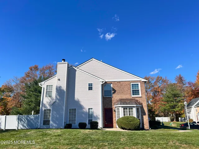 a view of a house with a big yard
