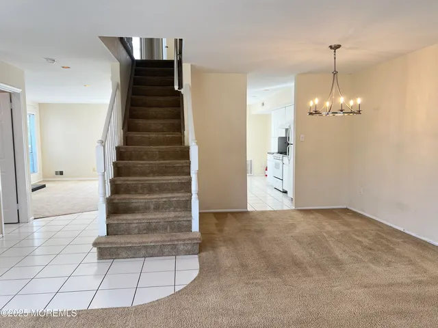 a view of an entryway with staircase