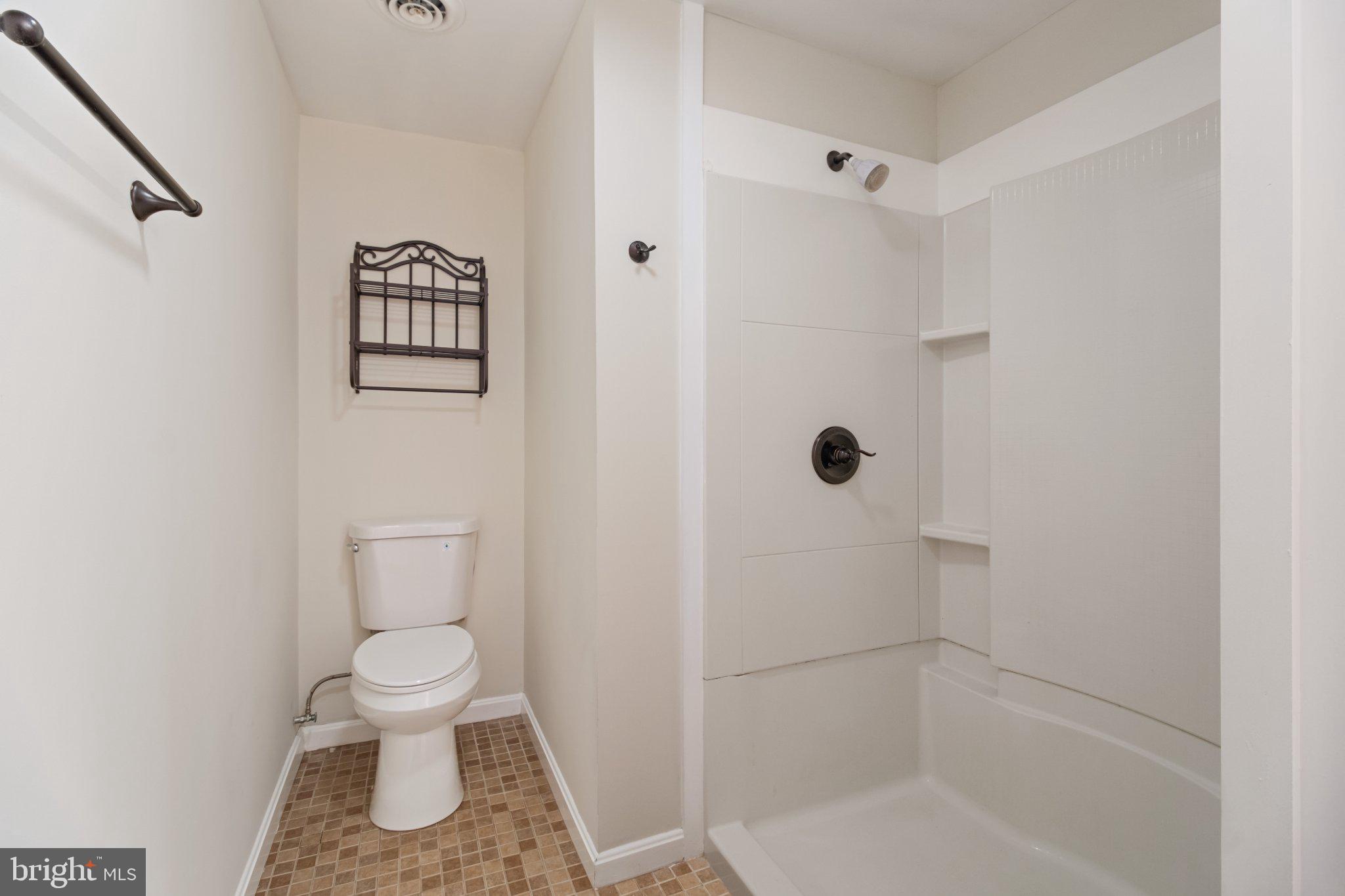 7147 Linganore Road New Market, MD 21774 - Photo 37 of 44 Modern bathroom with sleek finishes.