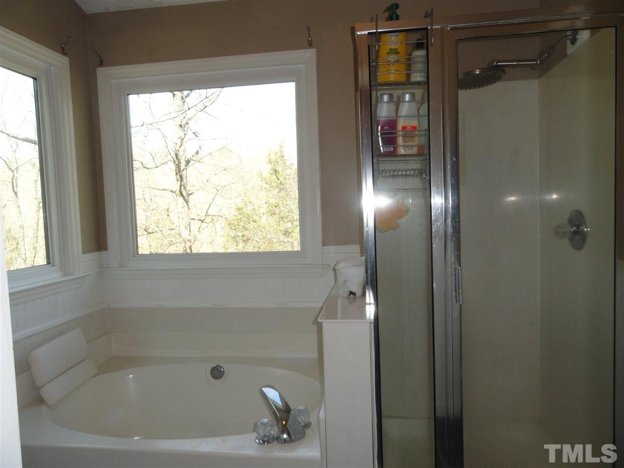 3520 Ribcowski Court Raleigh, NC 27616 - Photo 14 of 25 a bathroom with a bathtub
