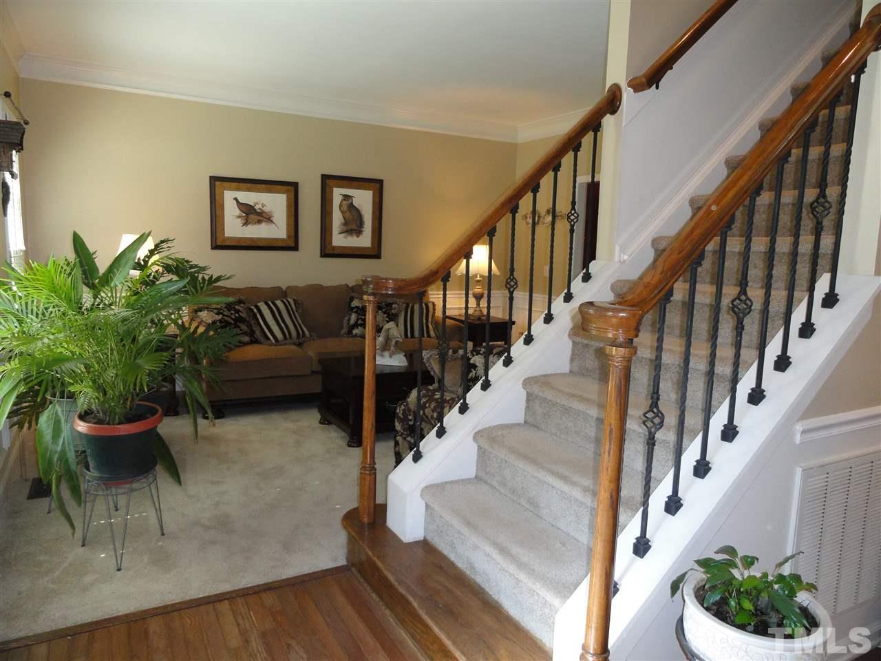 3520 Ribcowski Court Raleigh, NC 27616 - Photo 4 of 25 a view of entryway and hall with wooden floor