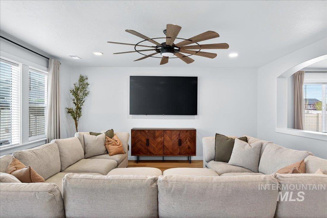 1993 North Perth Court Middleton, ID 83644 - Photo 2 of 45 Living area with ceiling fan, wood finished floors, and recessed lighting