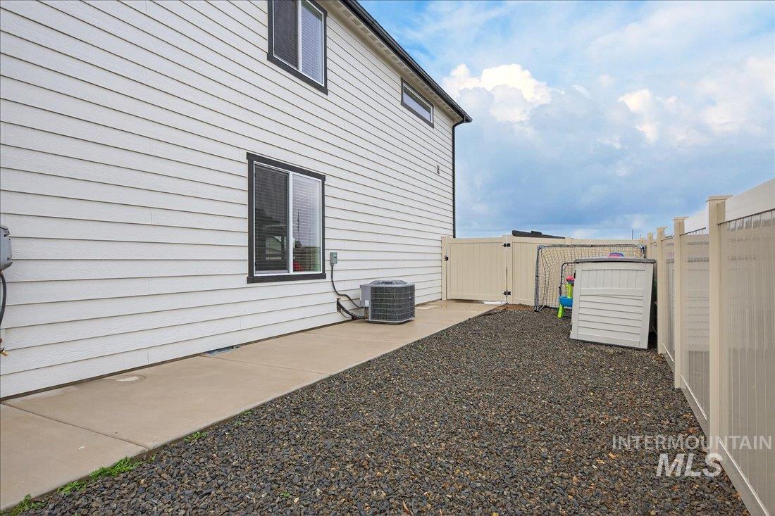 1993 North Perth Court Middleton, ID 83644 - Photo 28 of 45 Fenced backyard featuring a gate