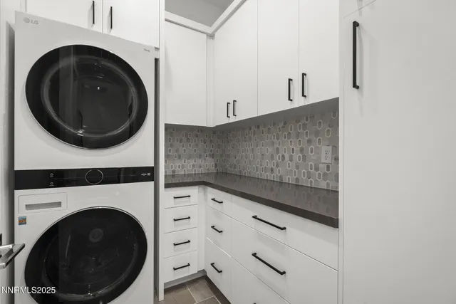a view of washer and dryer in a utility room