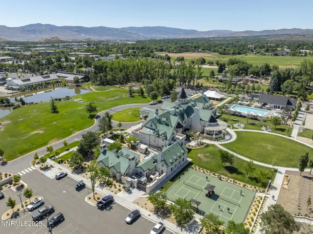 a view of a city with mountains in the background