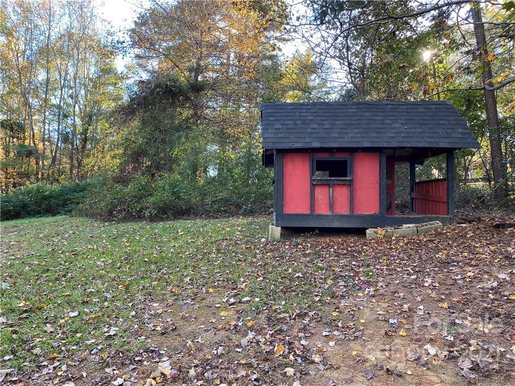 2888 Rimer Road Concord, NC 28025 - Photo 3 of 13 a backyard of a house with lots of green space