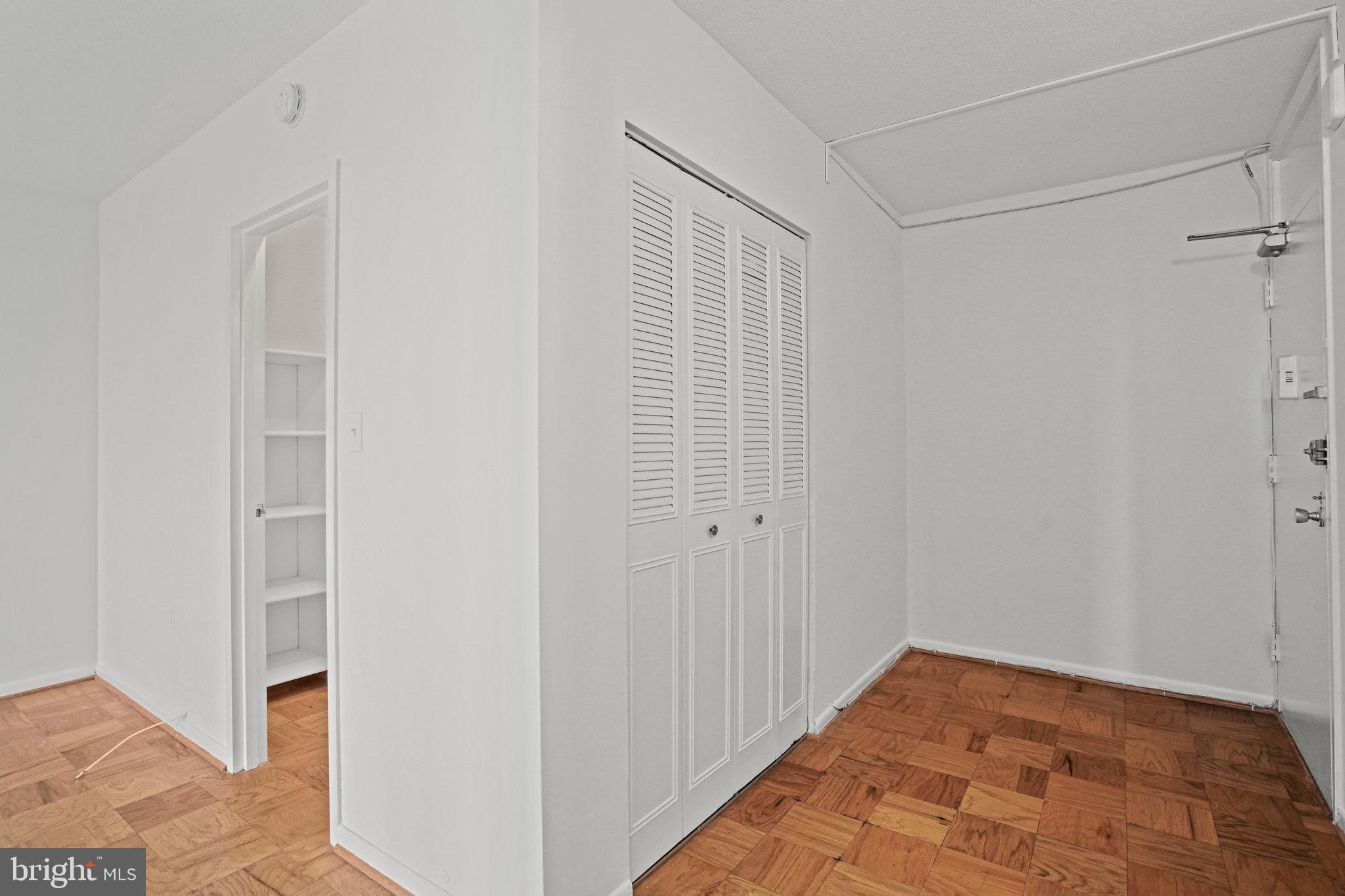 4242 East W Highway, Unit 605 Chevy Chase, MD 20815 - Photo 11 of 46 a view of a hallway