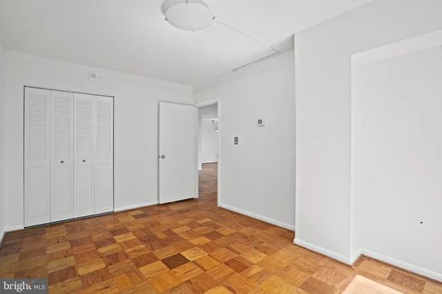 a bathroom with a toilet sink and shower