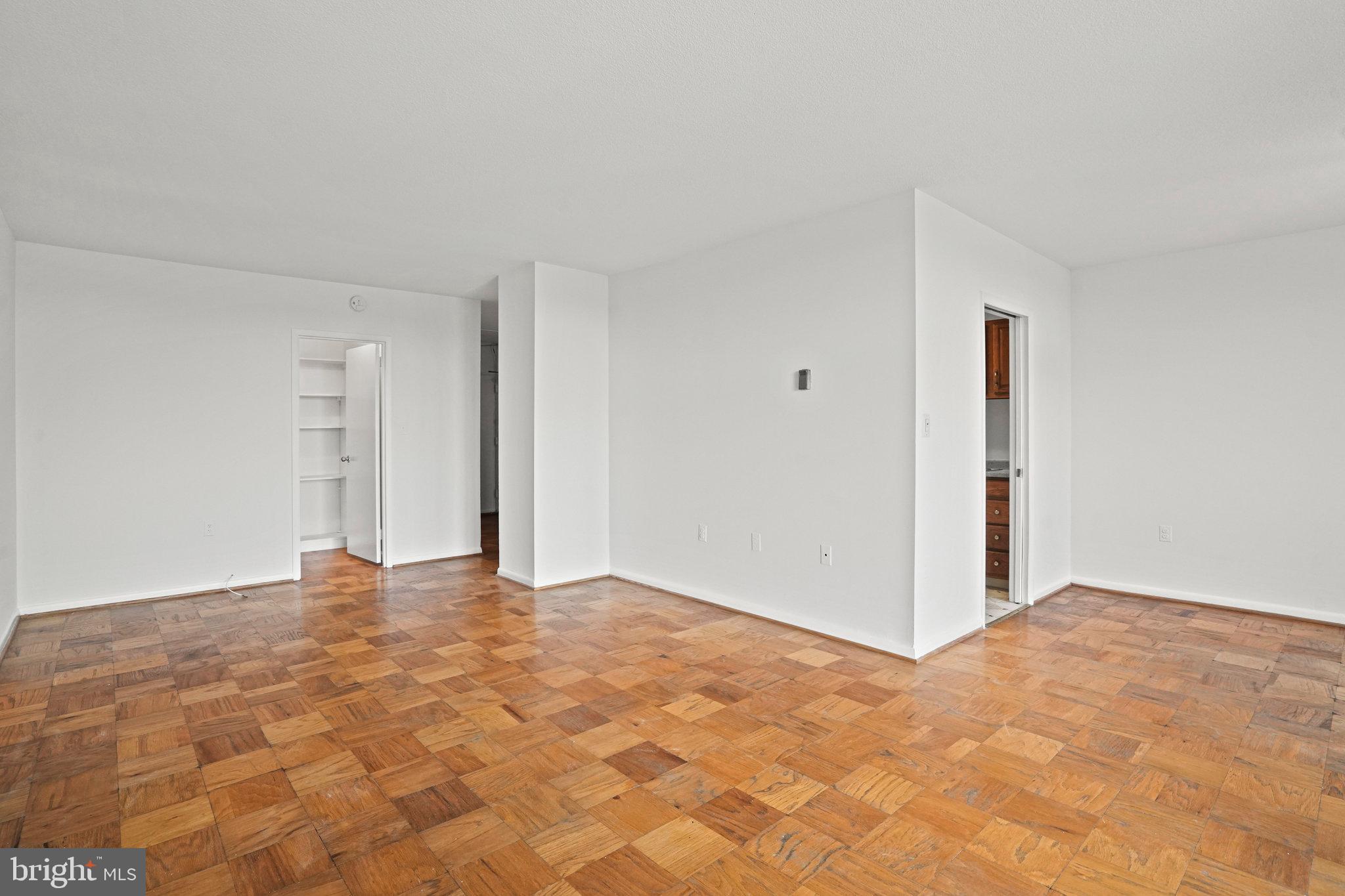 4242 East W Highway, Unit 605 Chevy Chase, MD 20815 - Photo 16 of 46 a view of an empty room