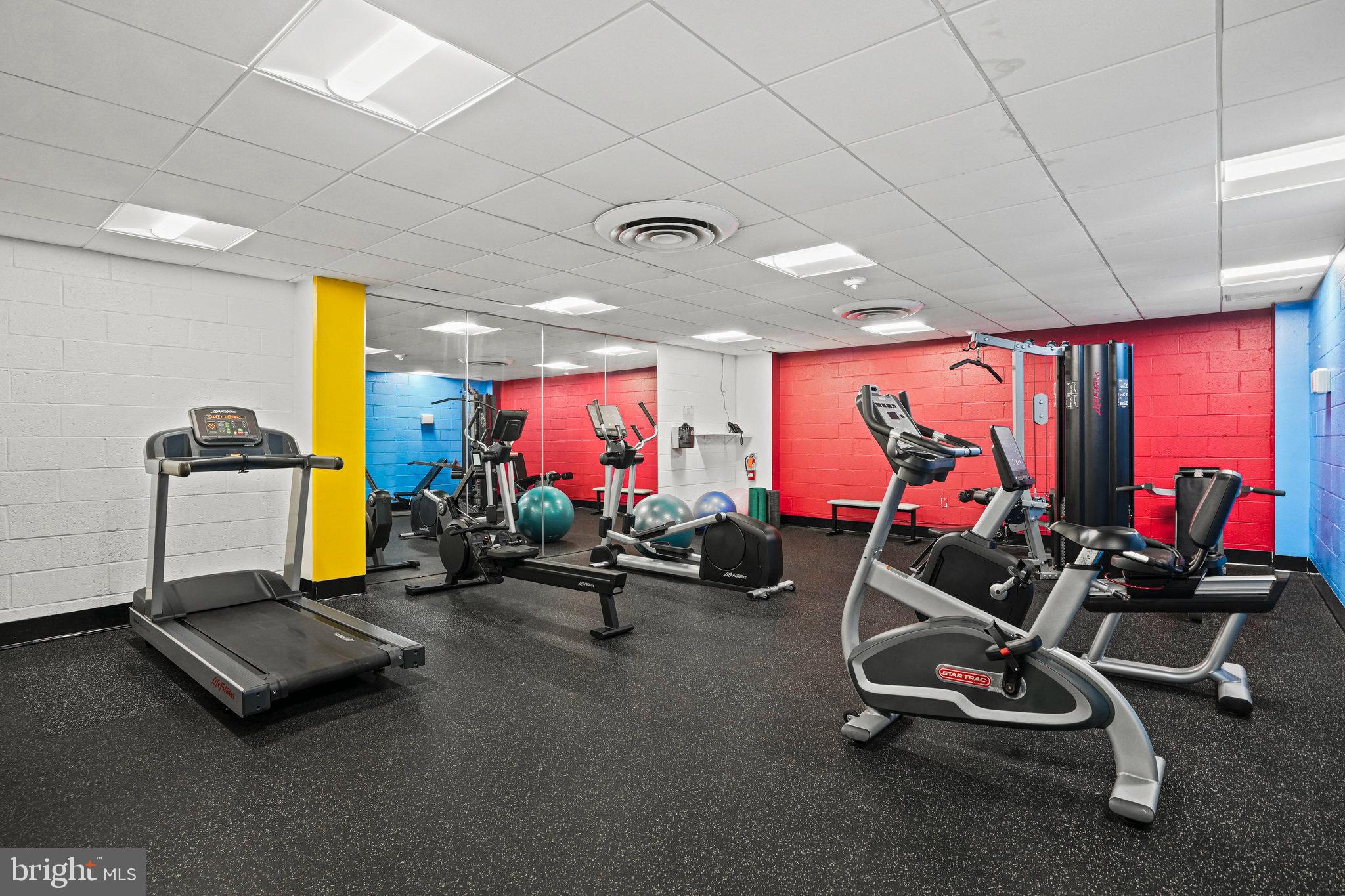 4242 East W Highway, Unit 605 Chevy Chase, MD 20815 - Photo 30 of 46 a view of a room with gym equipment