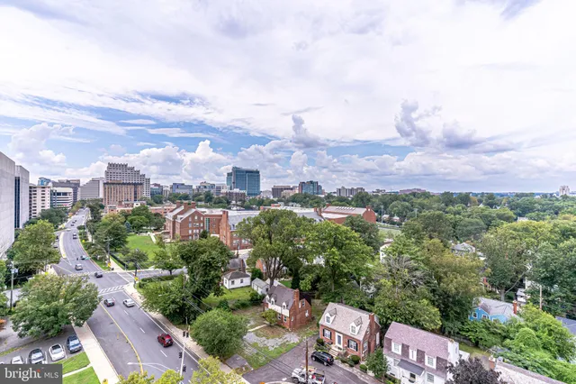 a view of a city with tall buildings