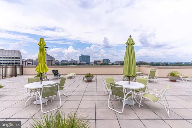 a view of a terrace with sitting area