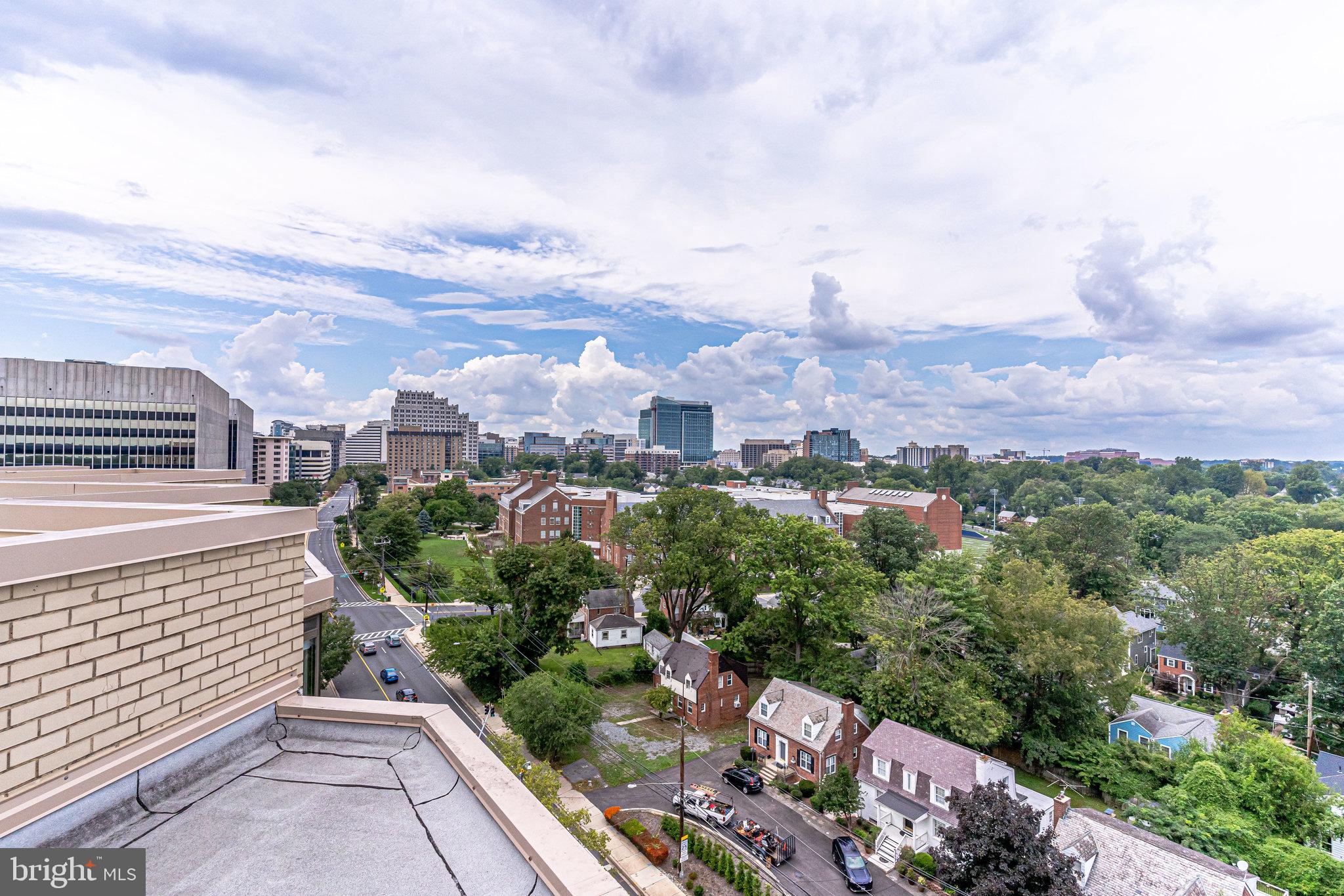 4242 East W Highway, Unit 605 Chevy Chase, MD 20815 - Photo 43 of 46 a view of a city with tall buildings