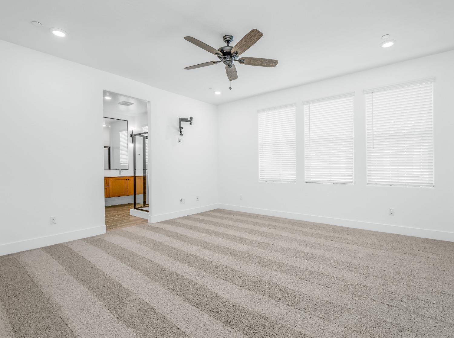 2734 East Teaberry Drive Fresno, CA 93730 - Photo 23 of 34 a view of an empty room with a window