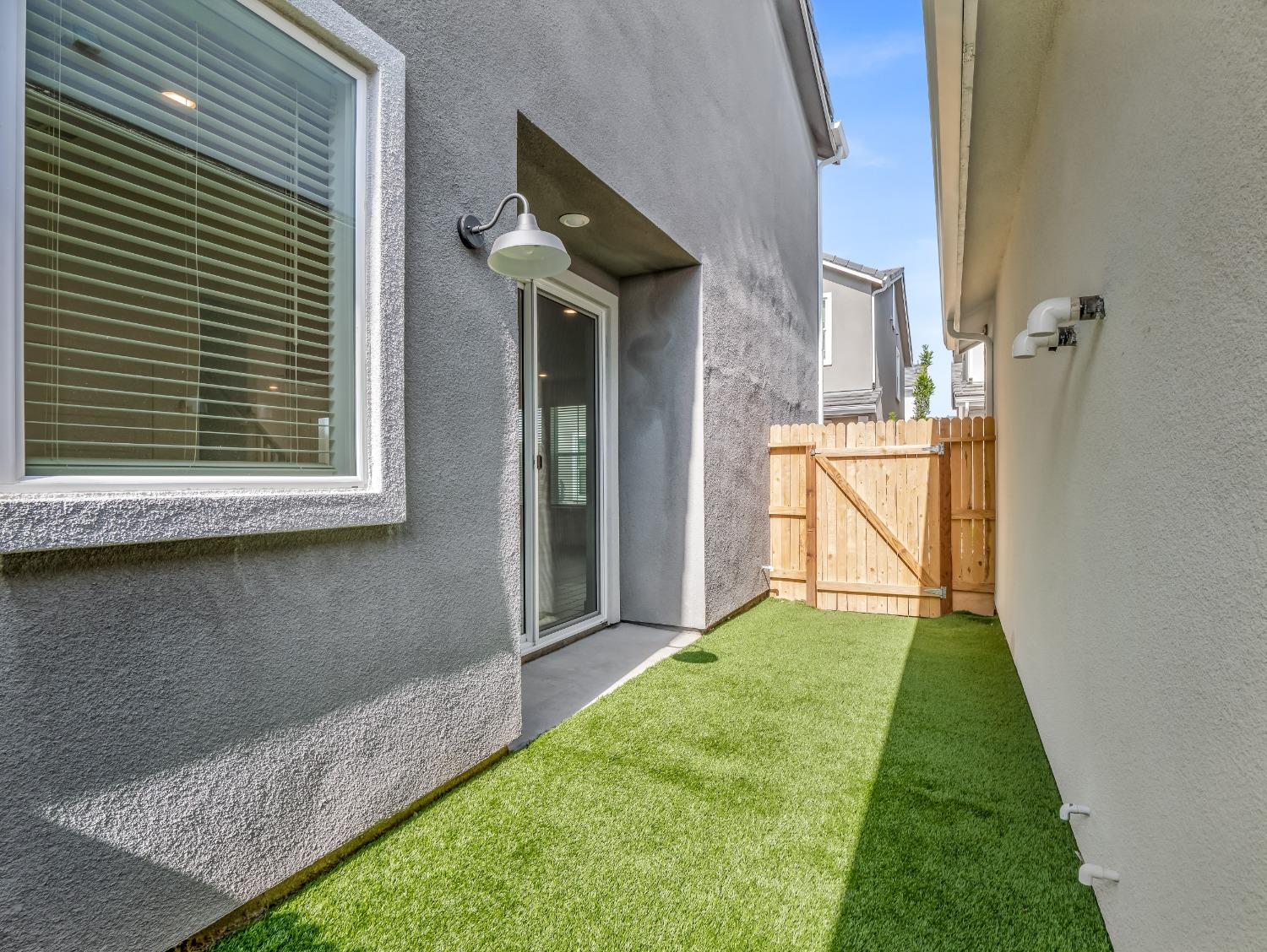 2734 East Teaberry Drive Fresno, CA 93730 - Photo 31 of 34 a view of a backyard of the house