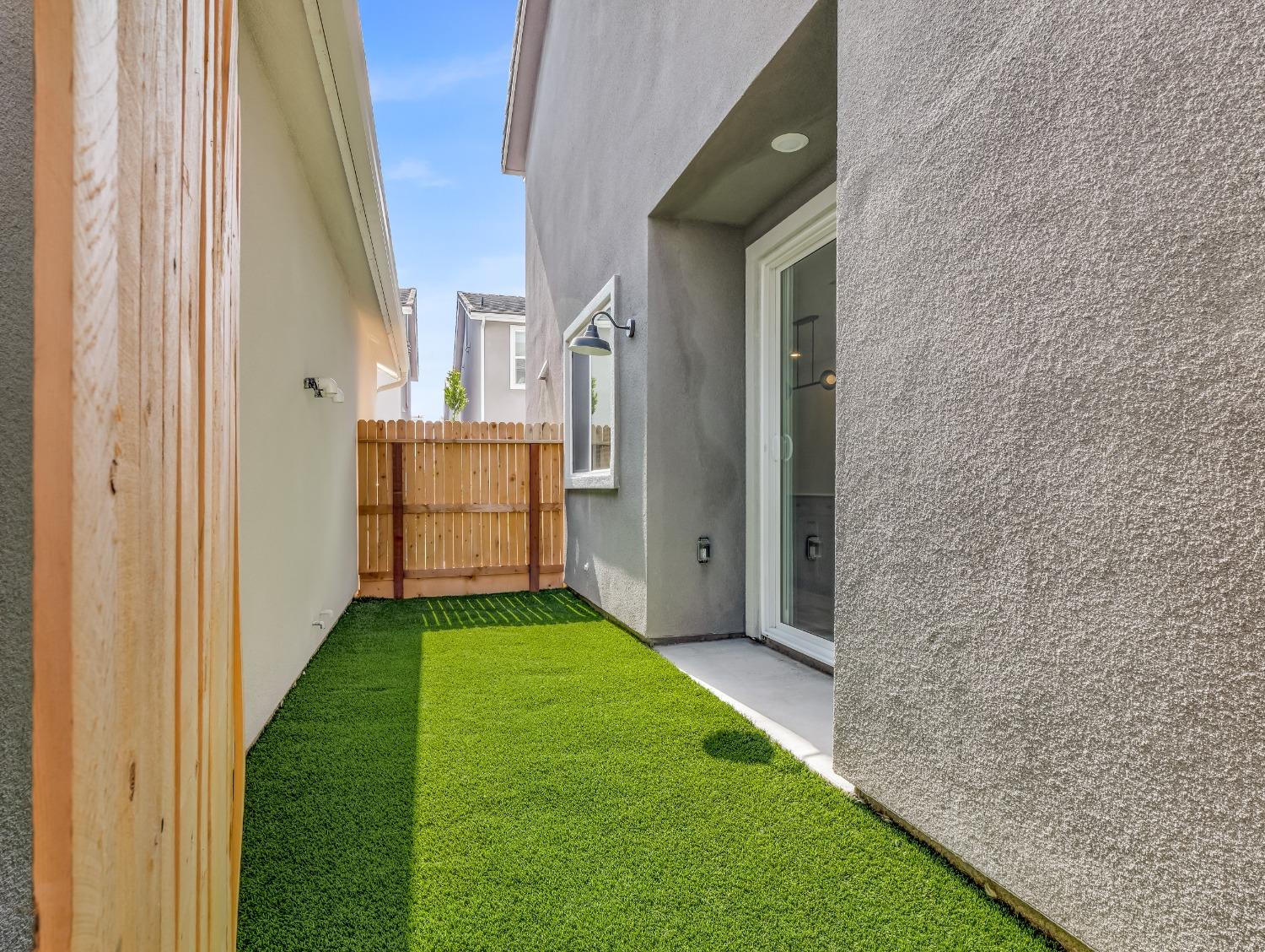 2734 East Teaberry Drive Fresno, CA 93730 - Photo 32 of 34 a view of an entrance of the house