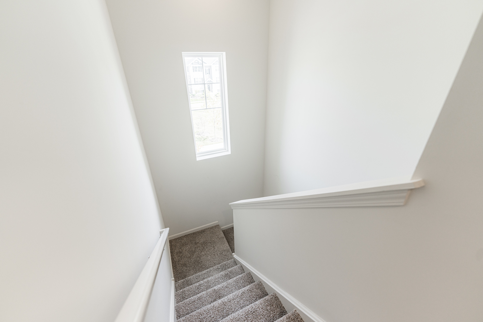 2016 Yellowstone Boulevard Mundelein, IL 60060 - Photo 12 of 30 a view of a room with wooden floor and white wall