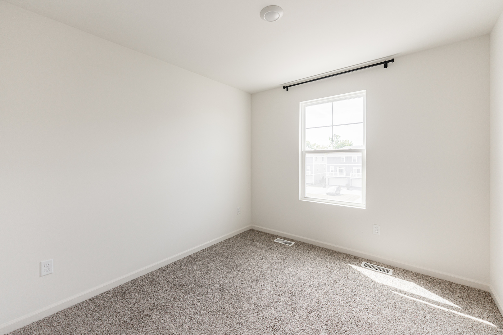 2016 Yellowstone Boulevard Mundelein, IL 60060 - Photo 21 of 30 an empty room with a window