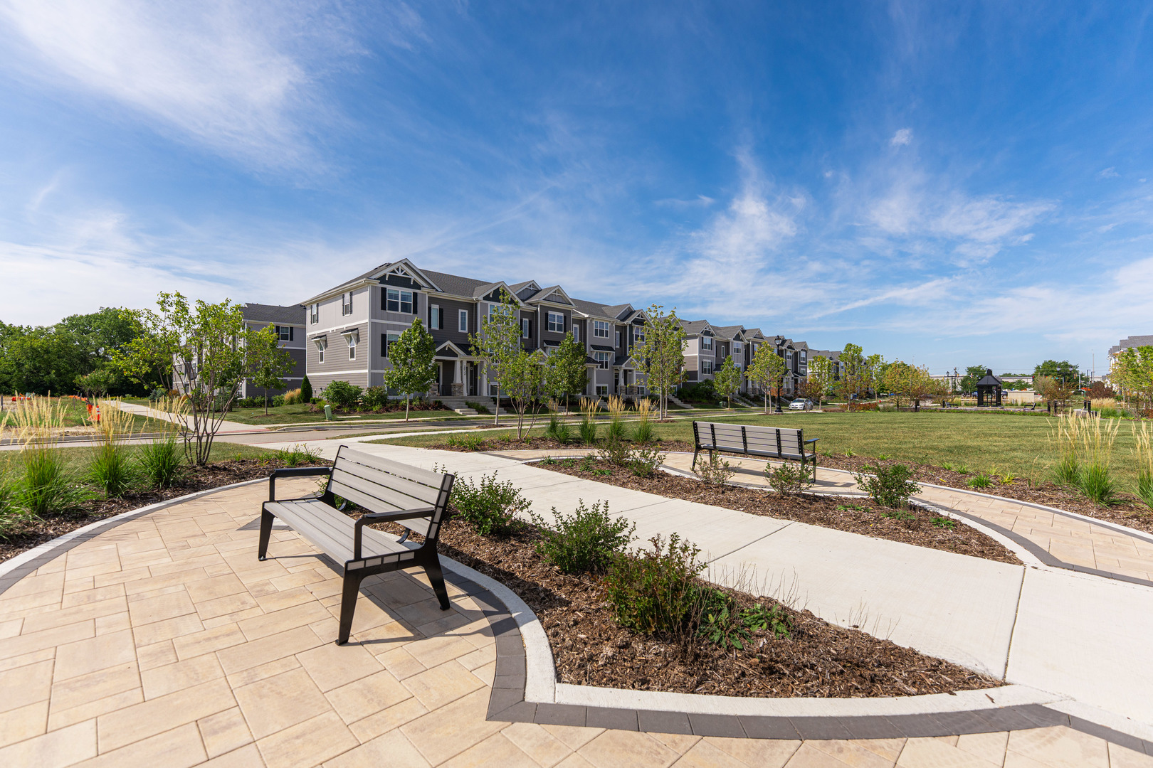 2016 Yellowstone Boulevard Mundelein, IL 60060 - Photo 30 of 30 a swimming pool with outdoor seating and garden