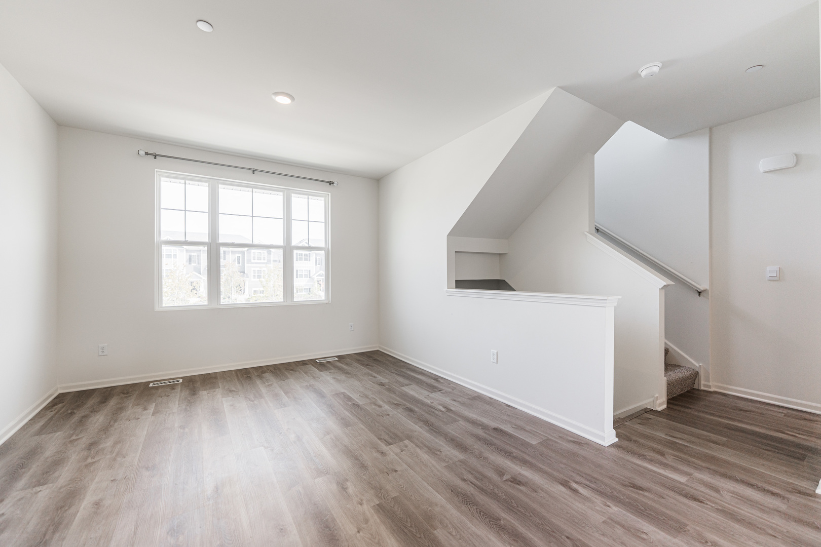 2016 Yellowstone Boulevard Mundelein, IL 60060 - Photo 3 of 30 wooden floor in an empty room with a window