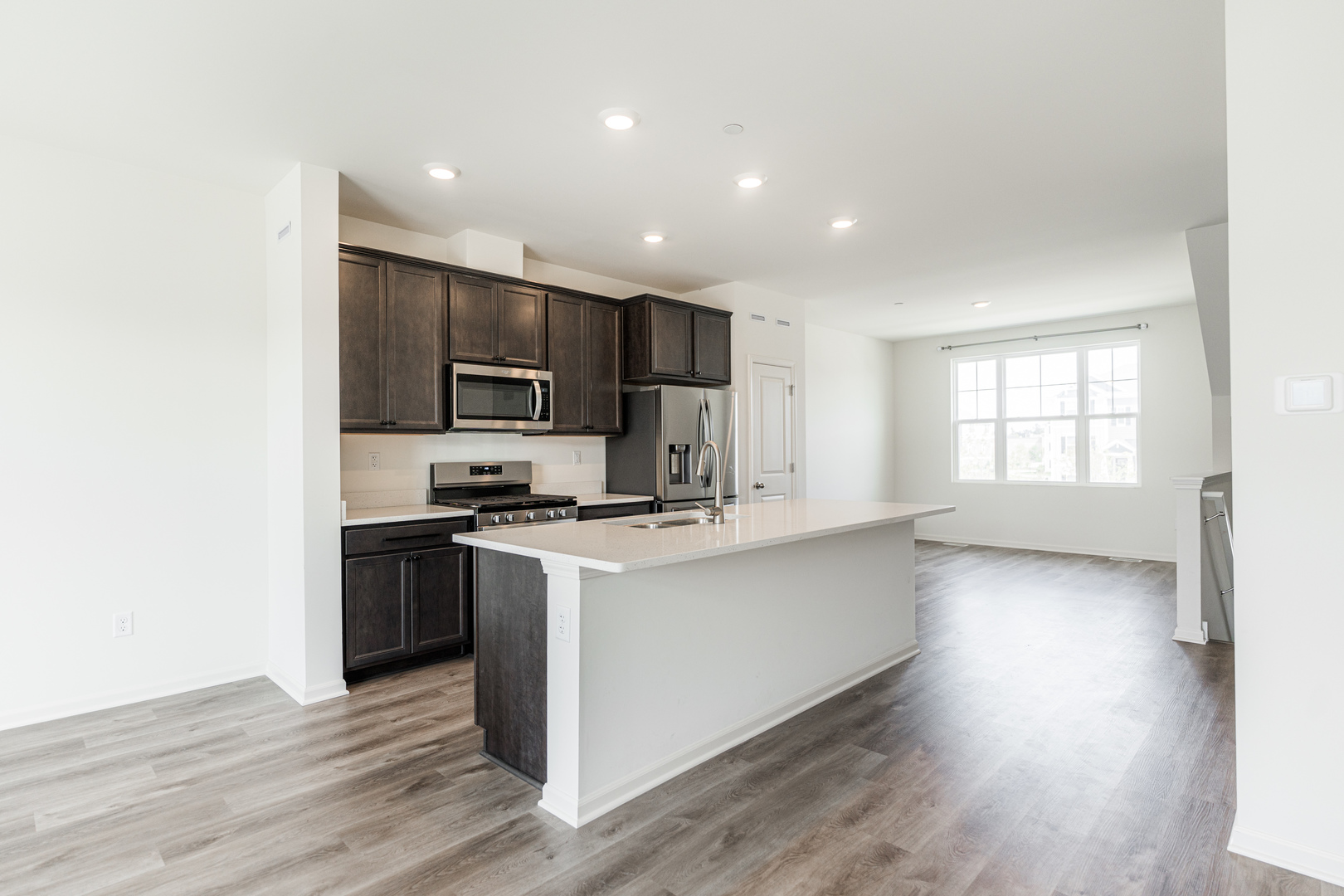 2016 Yellowstone Boulevard Mundelein, IL 60060 - Photo 6 of 30 a kitchen with stainless steel appliances granite countertop a stove a sink and a refrigerator