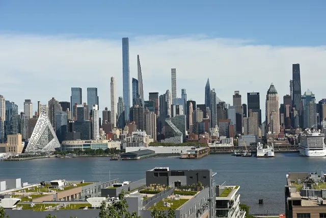 a view of water with a tall building