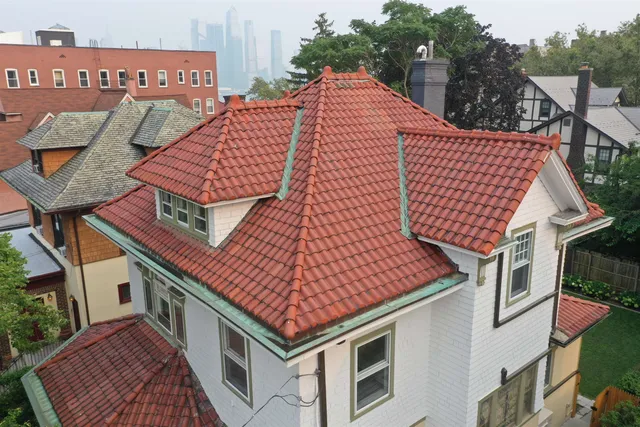 an aerial view of a house with swimming pool